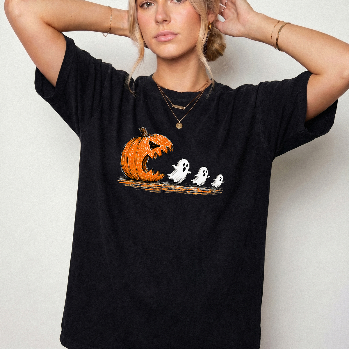 Spooky Ghost Chasing Pumpkin Vintage Graphic Tee | Foxfire & Fable