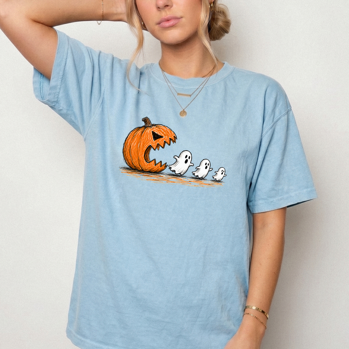 Spooky Ghost Chasing Pumpkin Vintage Graphic Tee | Foxfire & Fable