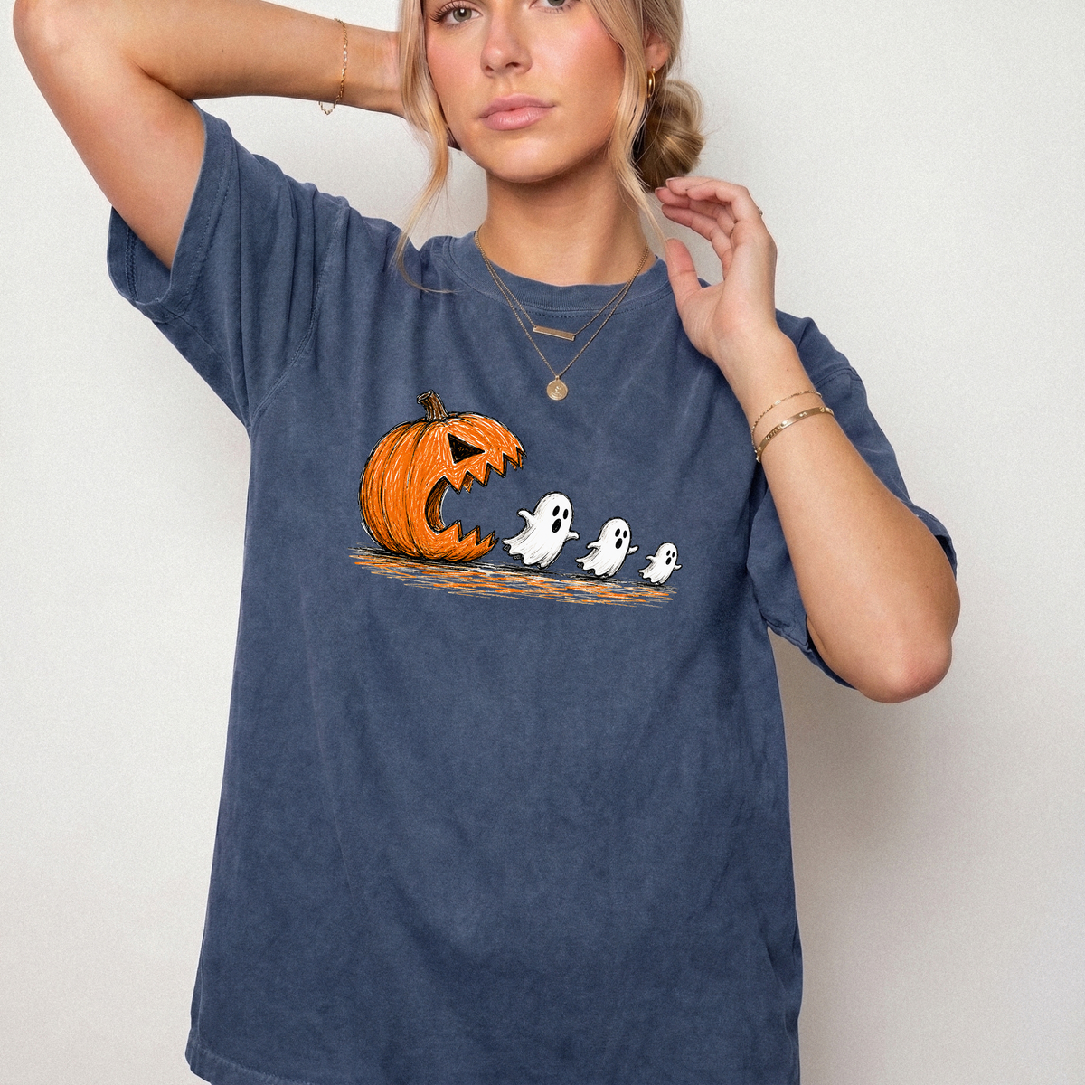 Spooky Ghost Chasing Pumpkin Vintage Graphic Tee | Foxfire & Fable