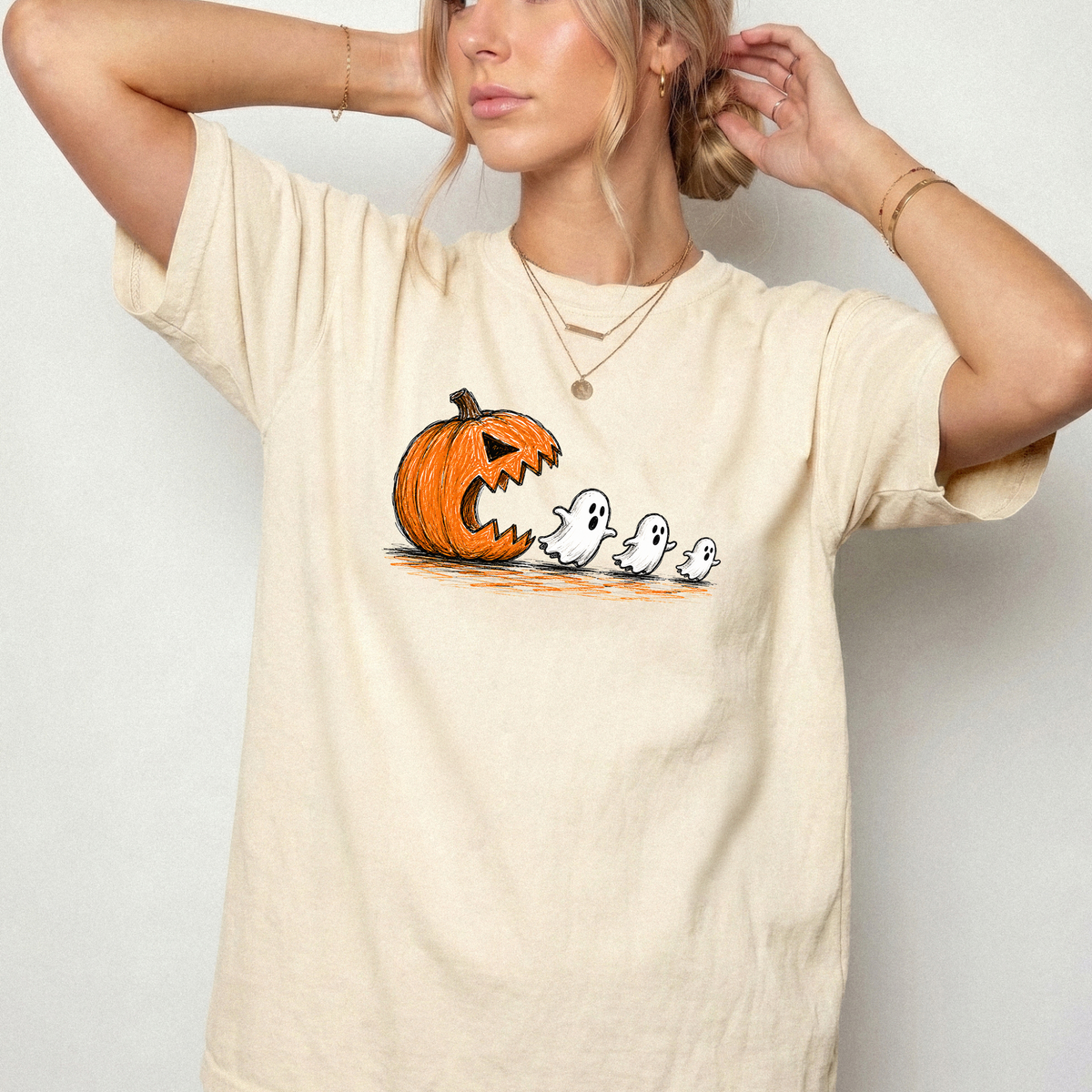 Spooky Ghost Chasing Pumpkin Vintage Graphic Tee | Foxfire & Fable