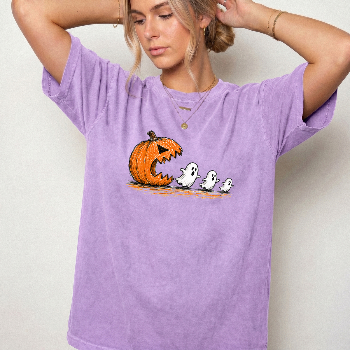 Spooky Ghost Chasing Pumpkin Vintage Graphic Tee | Foxfire & Fable