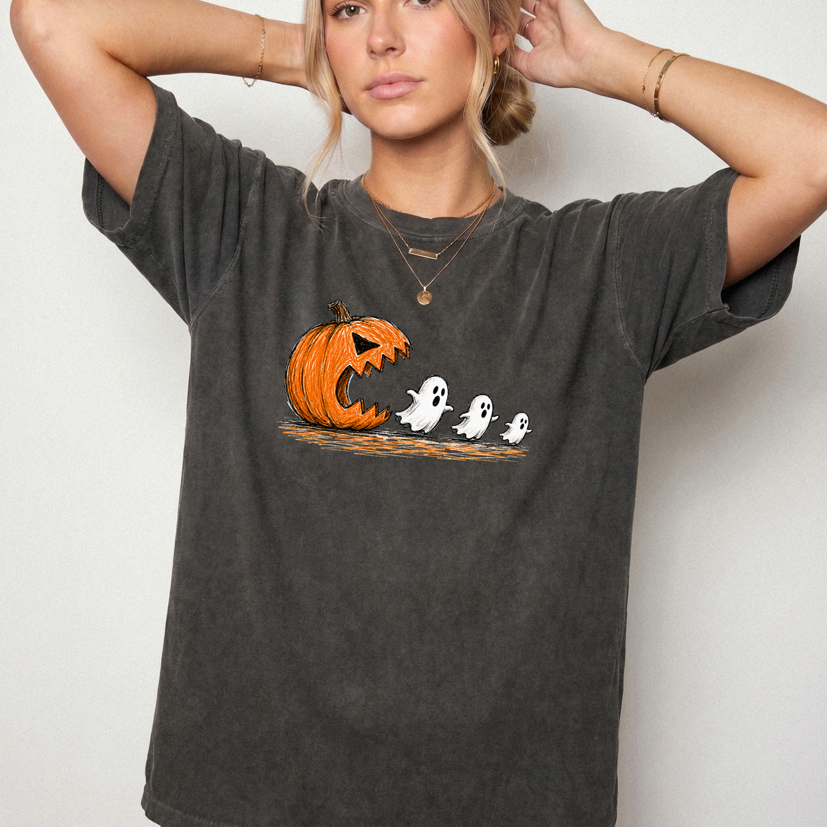 Spooky Ghost Chasing Pumpkin Vintage Graphic Tee | Foxfire & Fable