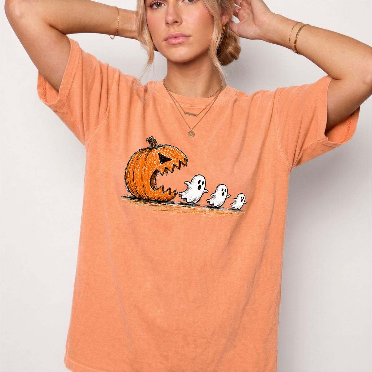 Spooky Ghost Chasing Pumpkin Vintage Graphic Tee | Foxfire & Fable