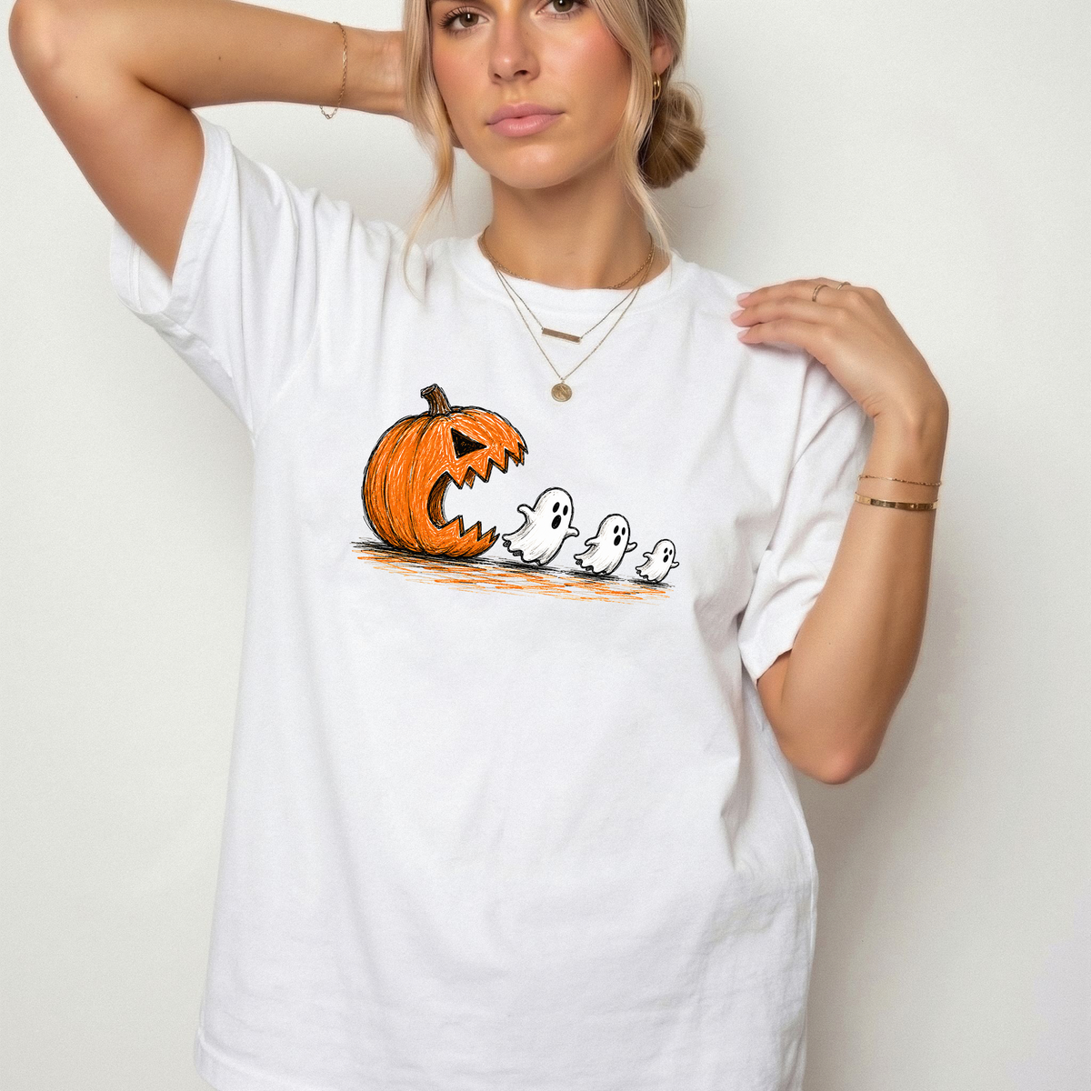 Spooky Ghost Chasing Pumpkin Vintage Graphic Tee | Foxfire & Fable